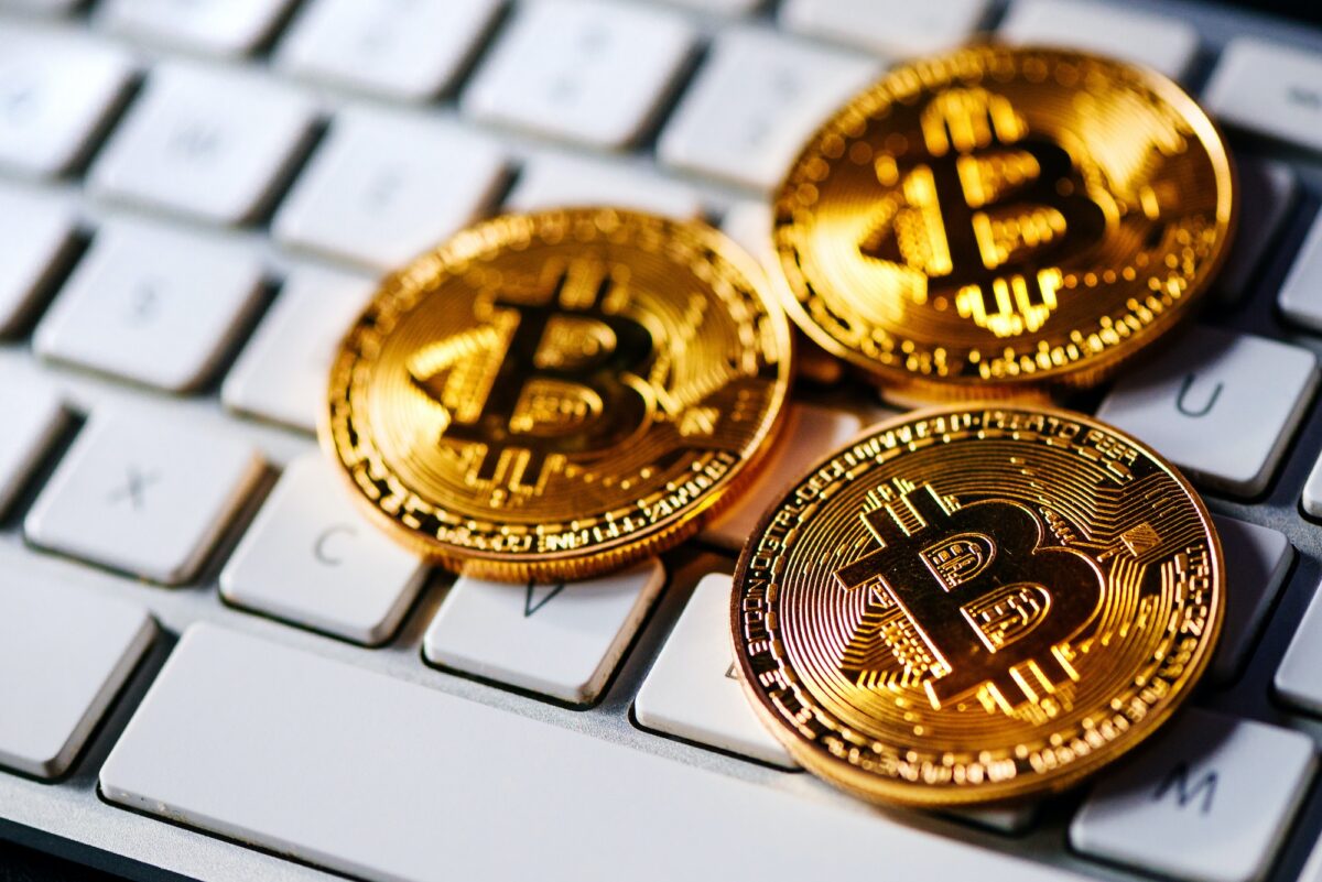 Bitcoins on computer keyboard