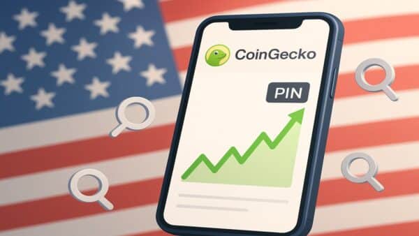 Smartphone affichant la popularité de la crypto PinLink (PIN) sur CoinGecko avec un drapeau américain, illustrant la tendance aux USA.